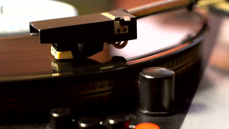 vinyl record on the pleer. plays a song from an old turntable.