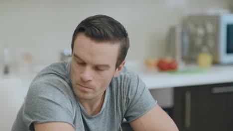 annoyed husband arguing with wife at kitchen. closeup angry man feeling upset