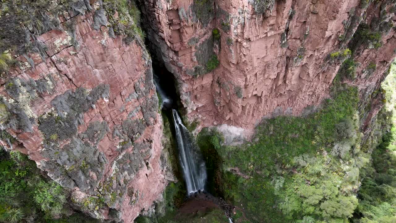 Aerial top down Shot of cascading Giant Perolniyoc waterfalls in Urubamba,Cusco, Peru