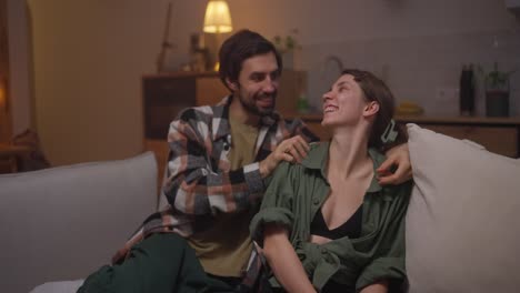 couple relaxing on a couch