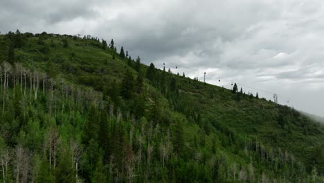 Aerial-of-low-fog-hanging-over-mountain-and-forest-trees-6