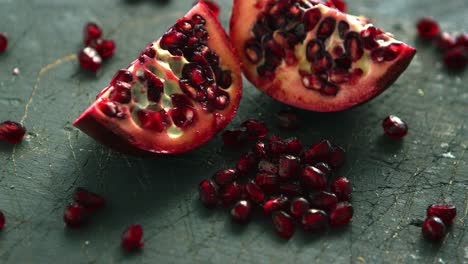 Ripe-pomegranate-halves-on-board