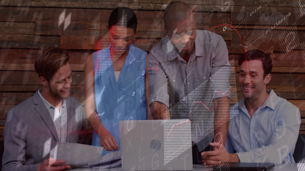 Business team collaborating over laptop with financial data animation overlay