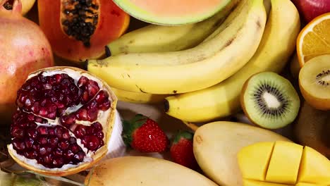 variety of fruits arranged on a white background