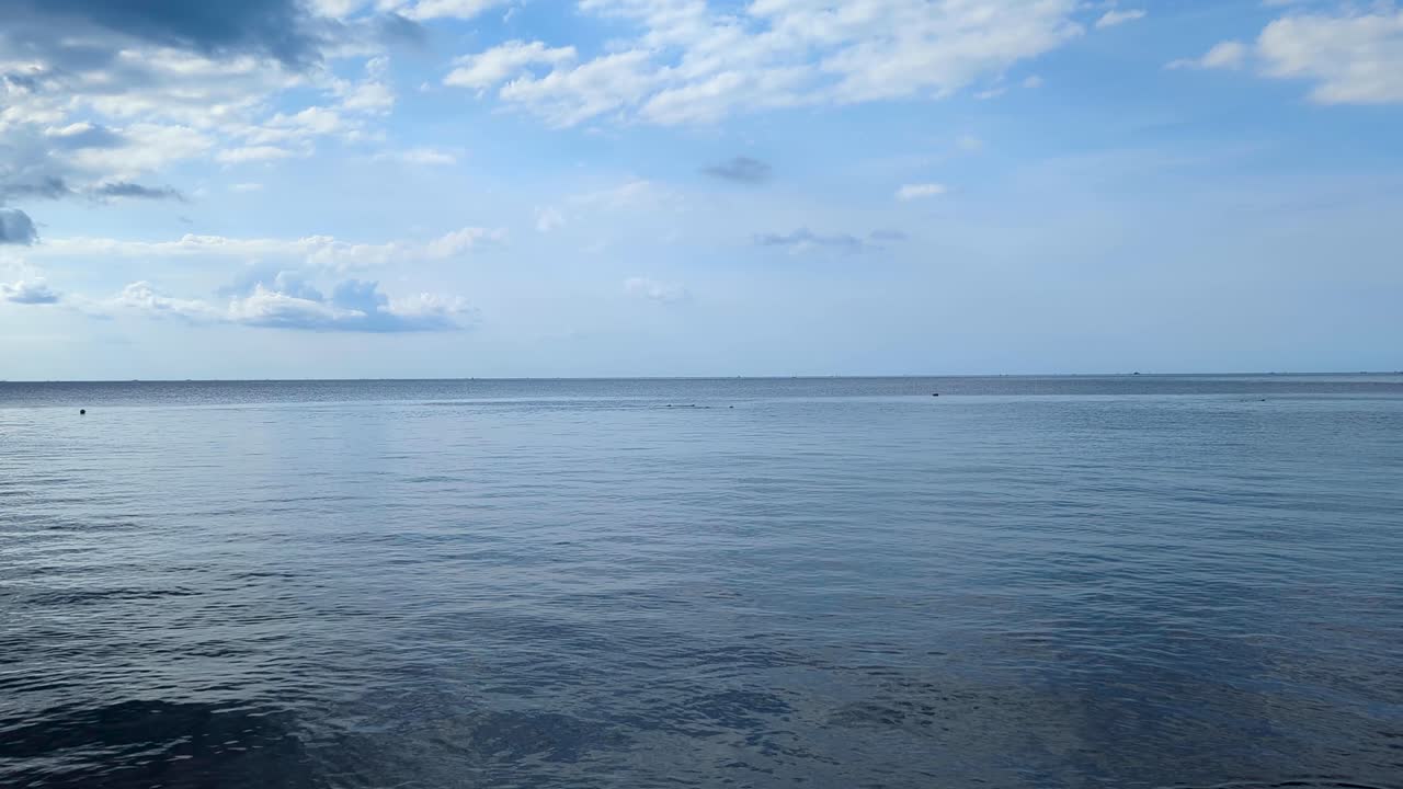 Tourist snorkeling in ocean at Amed on tropical island of Bali Indonesia