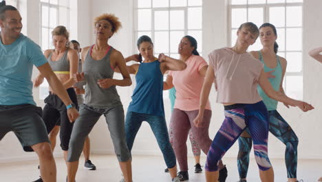 dance class happy group of multi ethnic people dancing enjoying training workout practicing choreography moves in fitness studio