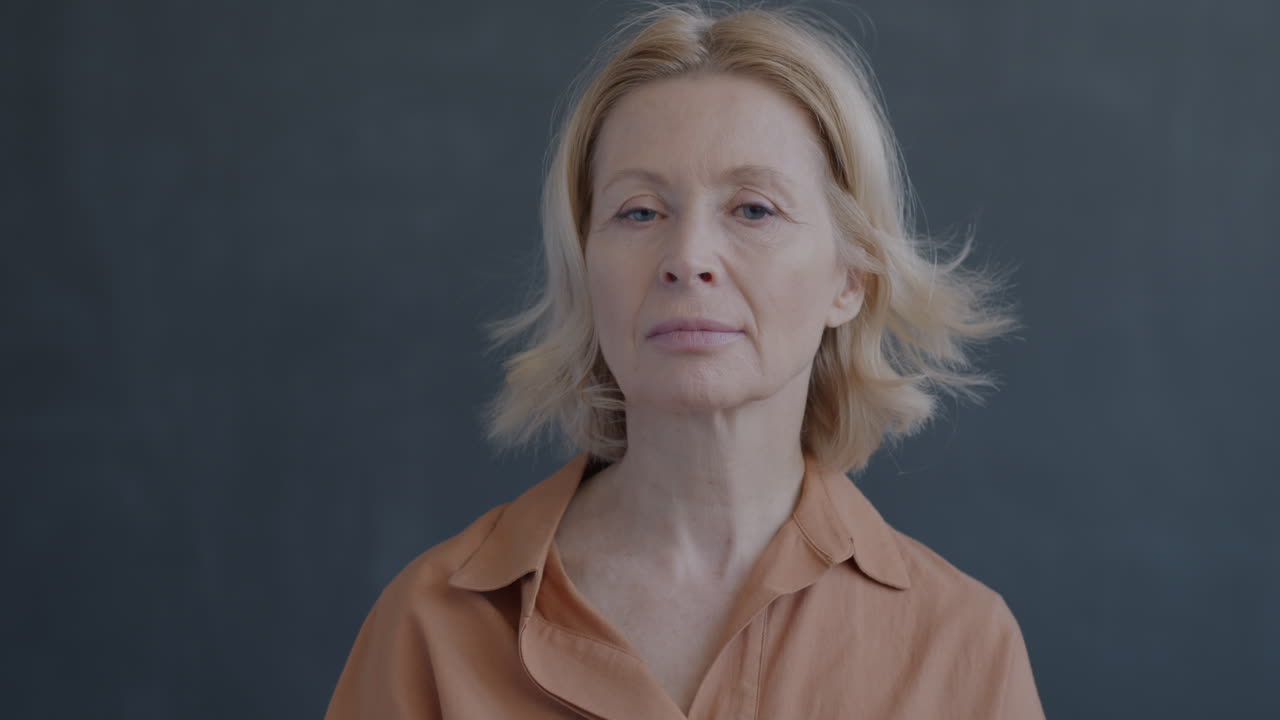 Woman with thumbs down