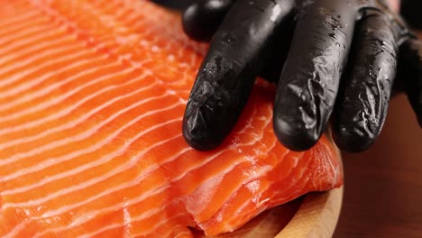 chef preparing fresh salmon