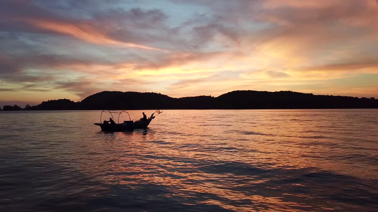Sunset Fishing Scene: Serene Ocean View with Fisherman in a Boat