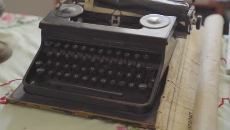 vintage antique typewriter on table of old, historic house