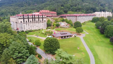 4k drone video of convention center and golf course at grove park inn in asheville, nc on sunny summer day-3