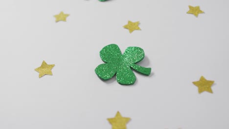 shamrocks and stars with copy space on white background