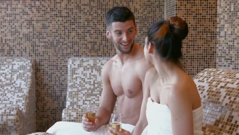 couple relaxing in thermal suite