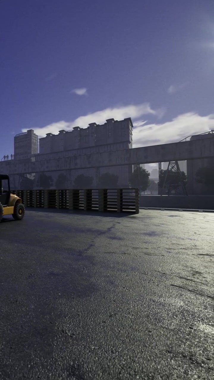 Construction site with machinery and pallets during daytime
