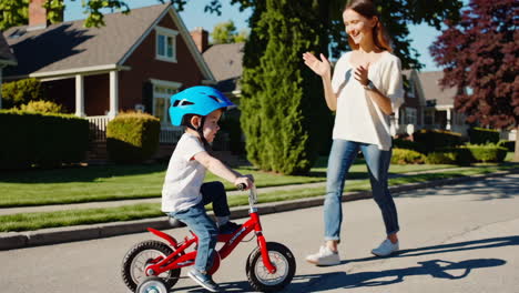 child learning to ride a balance bike