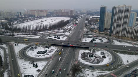 aerial drone view of road junction, large car interchange. aerial highway junction at winter evening, colorcorrected 4k footage