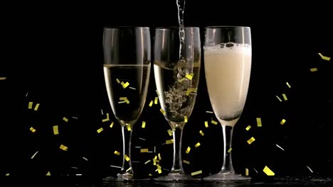 animation of gold confetti falling over champagne glasses on black background