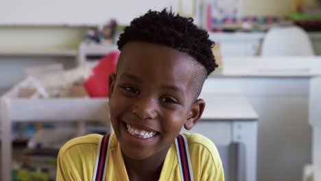 boy smiling in the class