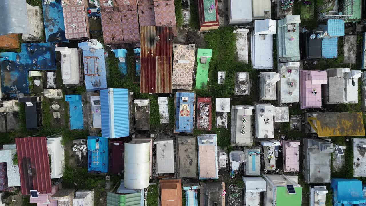 Aerial View of a Densely Packed Cemetery with Colorful Tombs