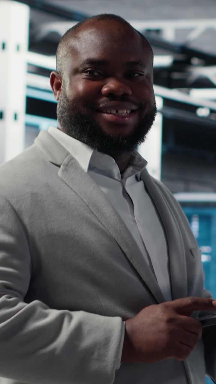 Vertical video Data center software developer using tablet to do AI algorithms improvements