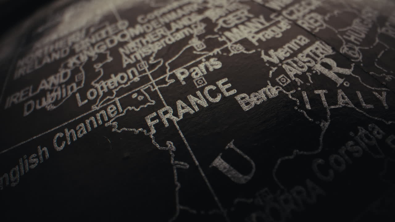 Close-up of a vintage world globe focusing on France