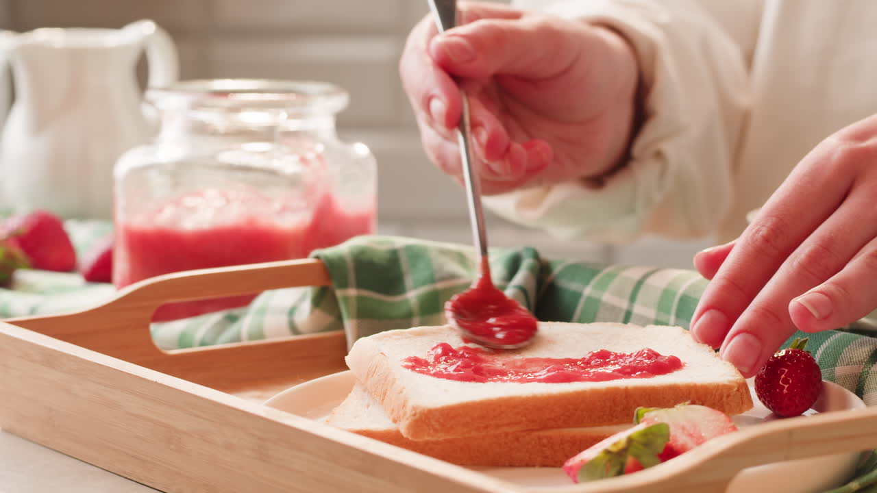 Making Strawberry Jam Toast
