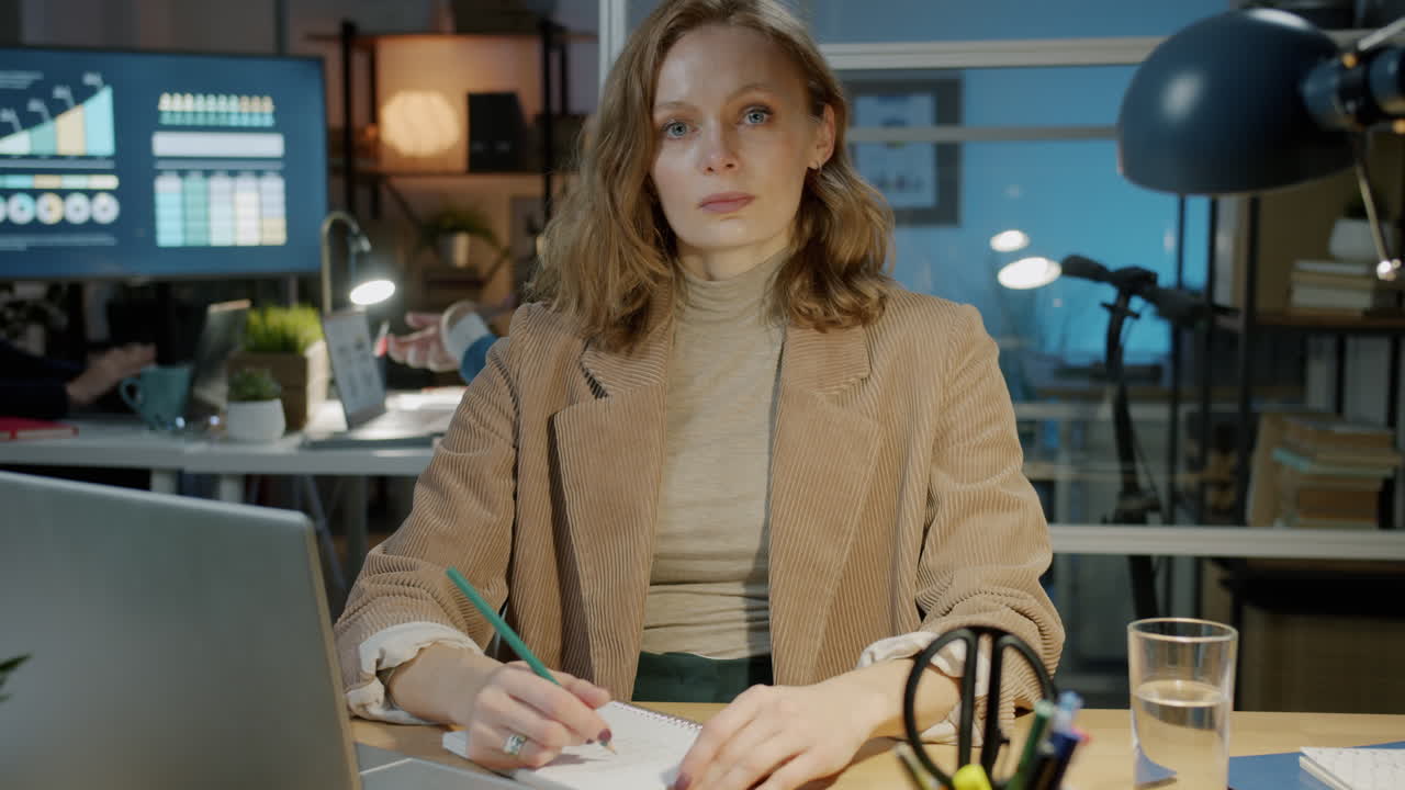 Businesswoman Working Late in Office
