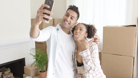 Fun-young-couple-taking-their-selfie