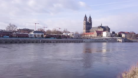 4k riverside of the elbe in magdeburg with dome, germany