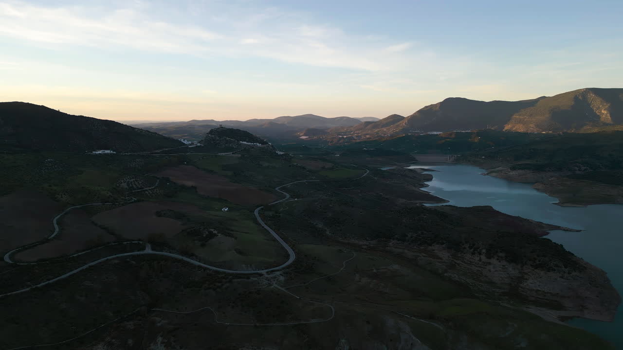 Beautiful Spain landscape after sunset with lake and mountains, aerial view