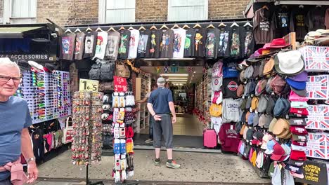 people browsing vibrant market stalls in london