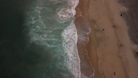 A-flight-over-a-Southern-California-Beach-at-sunset