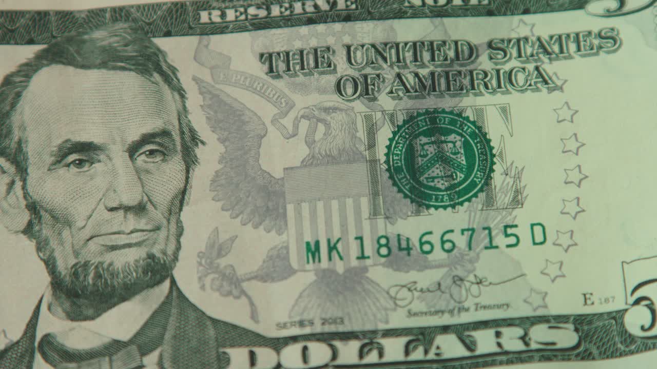 Close-up of a Five Dollar Bill Featuring Abraham Lincoln