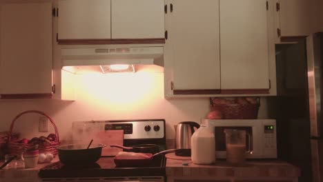 empty classic american style kitchen, preparing breakfast and boiling water on the stove