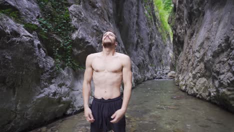 young man exercising at the creek.