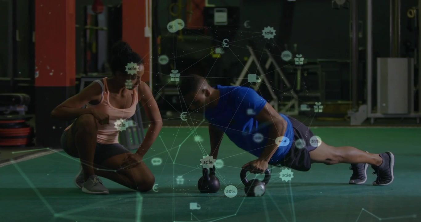 Personal Trainer Guiding Athlete During Kettlebell Push-Ups in Gym
