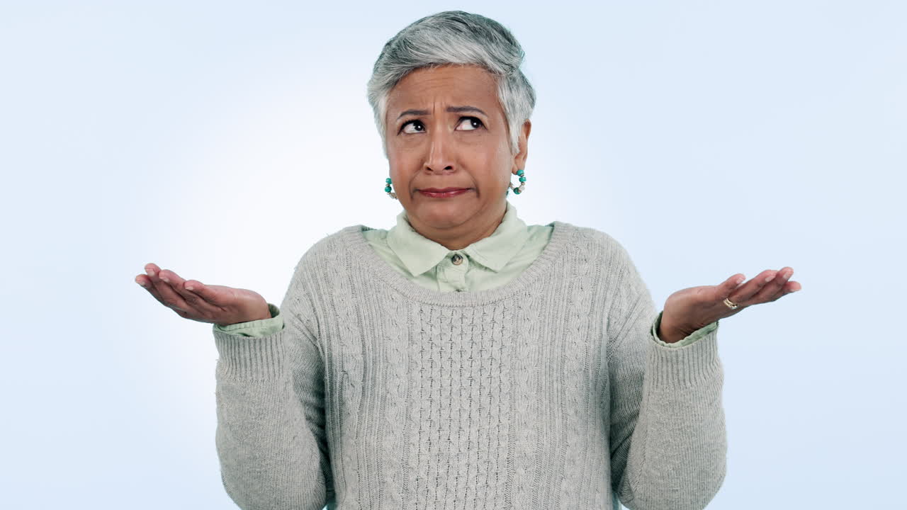 Confused, senior woman and shrug with hands