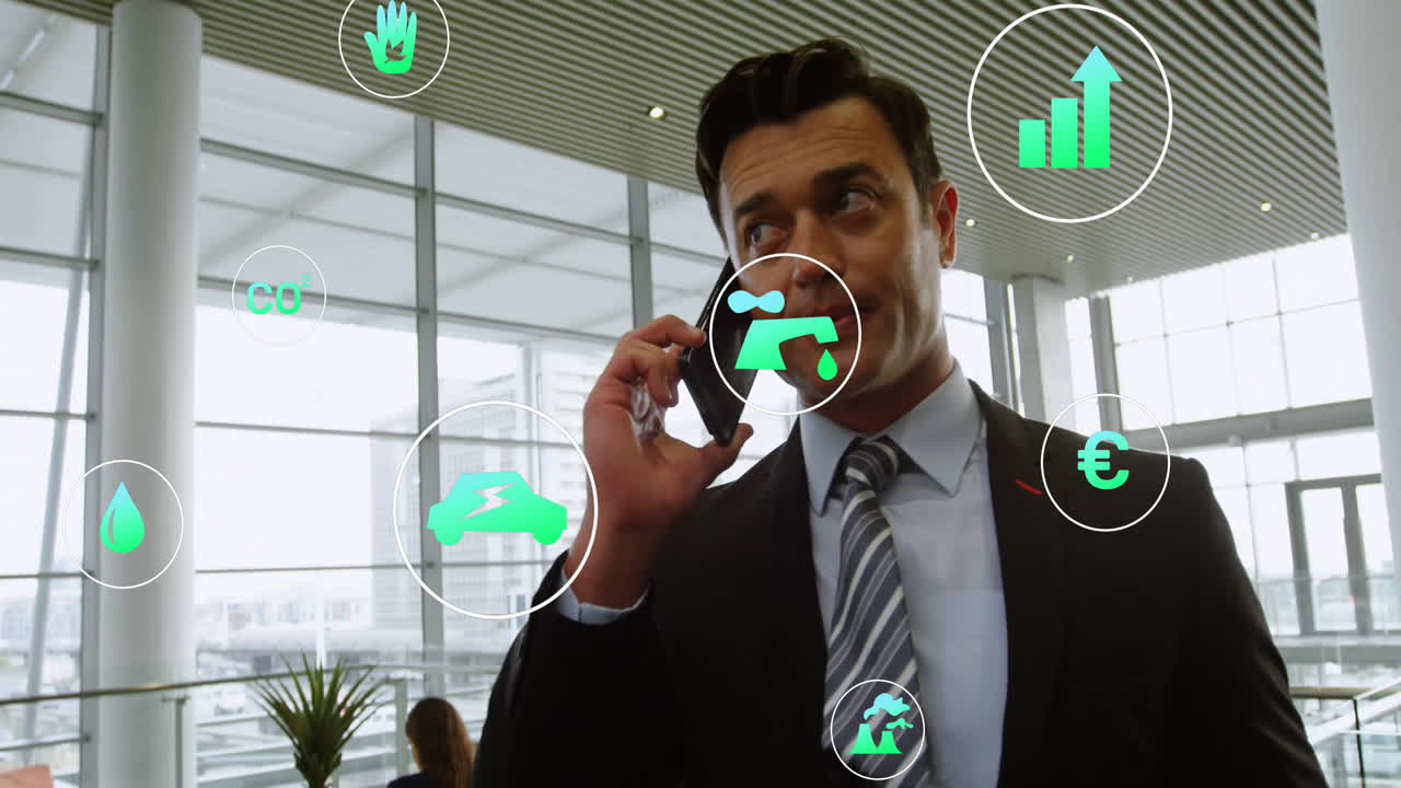 Talking on phone, businessman in office with animation of environmental icons