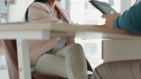 Secret-couple-in-office-flirting-with-feet-touch