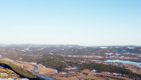 Aerial-View-Of-The-Clear-Blue-Sky-And-The-Beautiful-Greenery-Landscape-Of-Blaheia-In-Norway