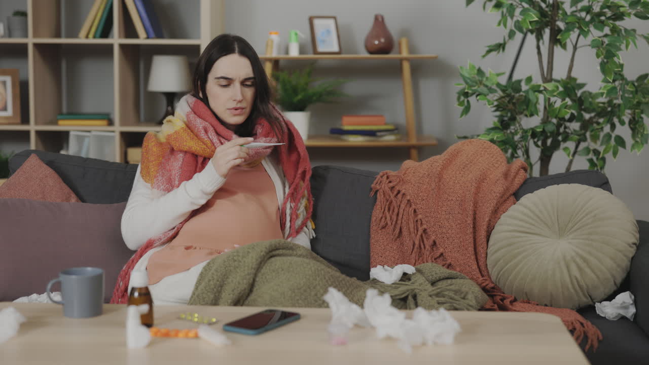 Pregnant Woman Feeling Ill at Home