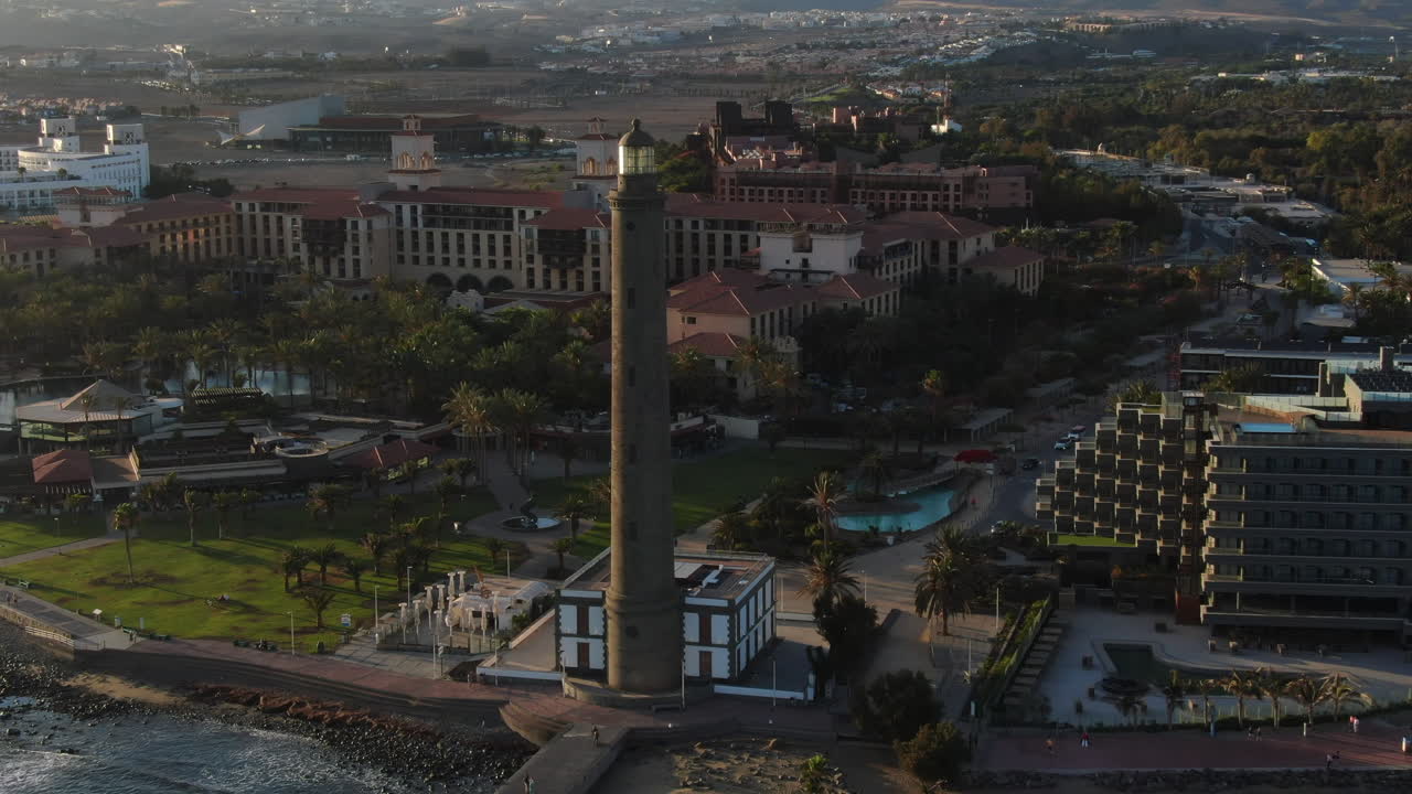 Aerial view of the historic lighthouse of Maspalomas in Gran Canaria with the city and resorts