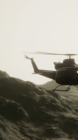 helicopter flying over mountains