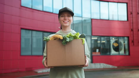 Courier-holding-box-outdoors