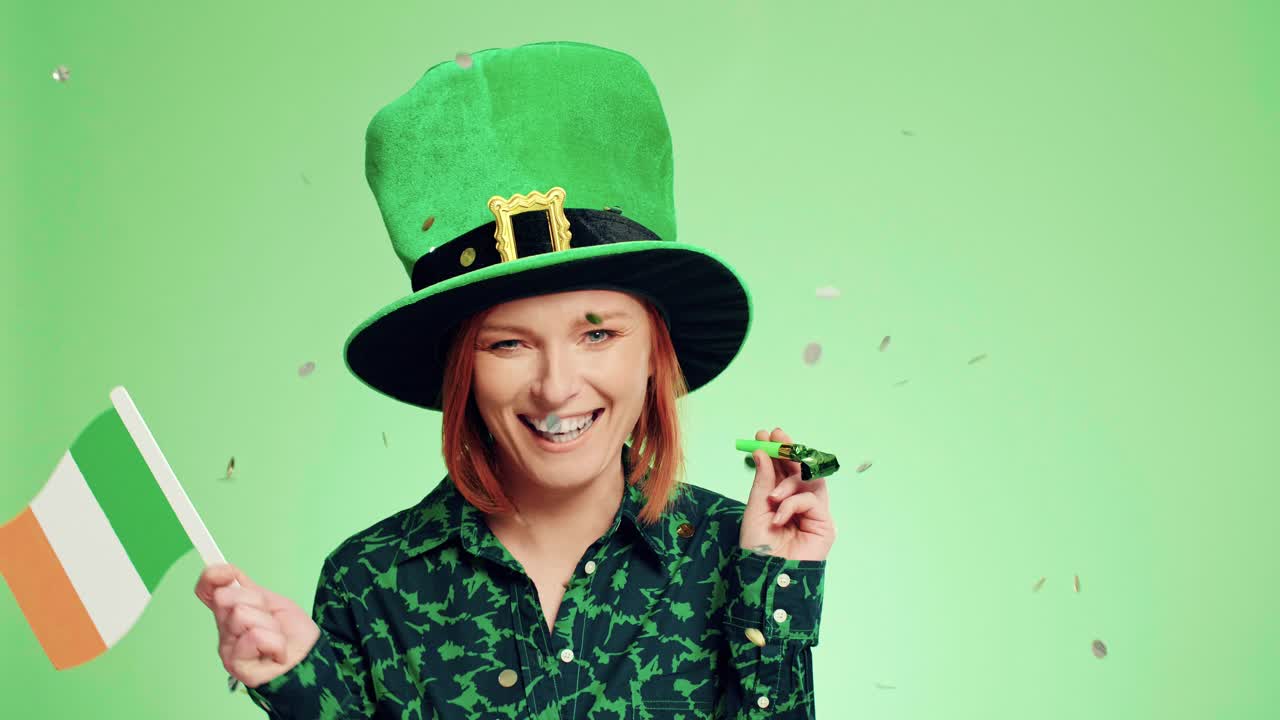 Playful woman celebrating Saint Patrick's Day in studio shot