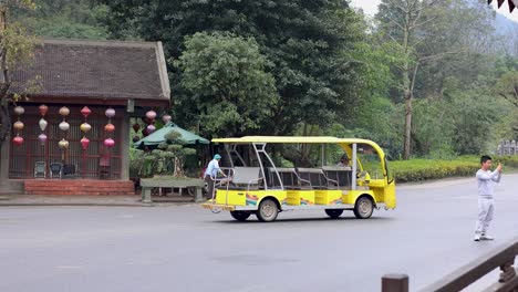 electric cart unloading boxes at a building