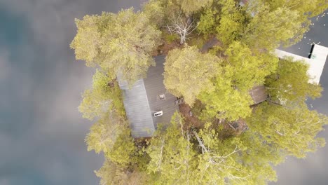 A-revealing-shot-of-a-cottage-in-an-island-in-Finland