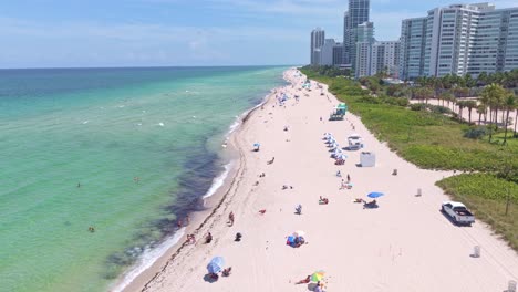 spectacular drone forward over miami beach in florida on a sunny day