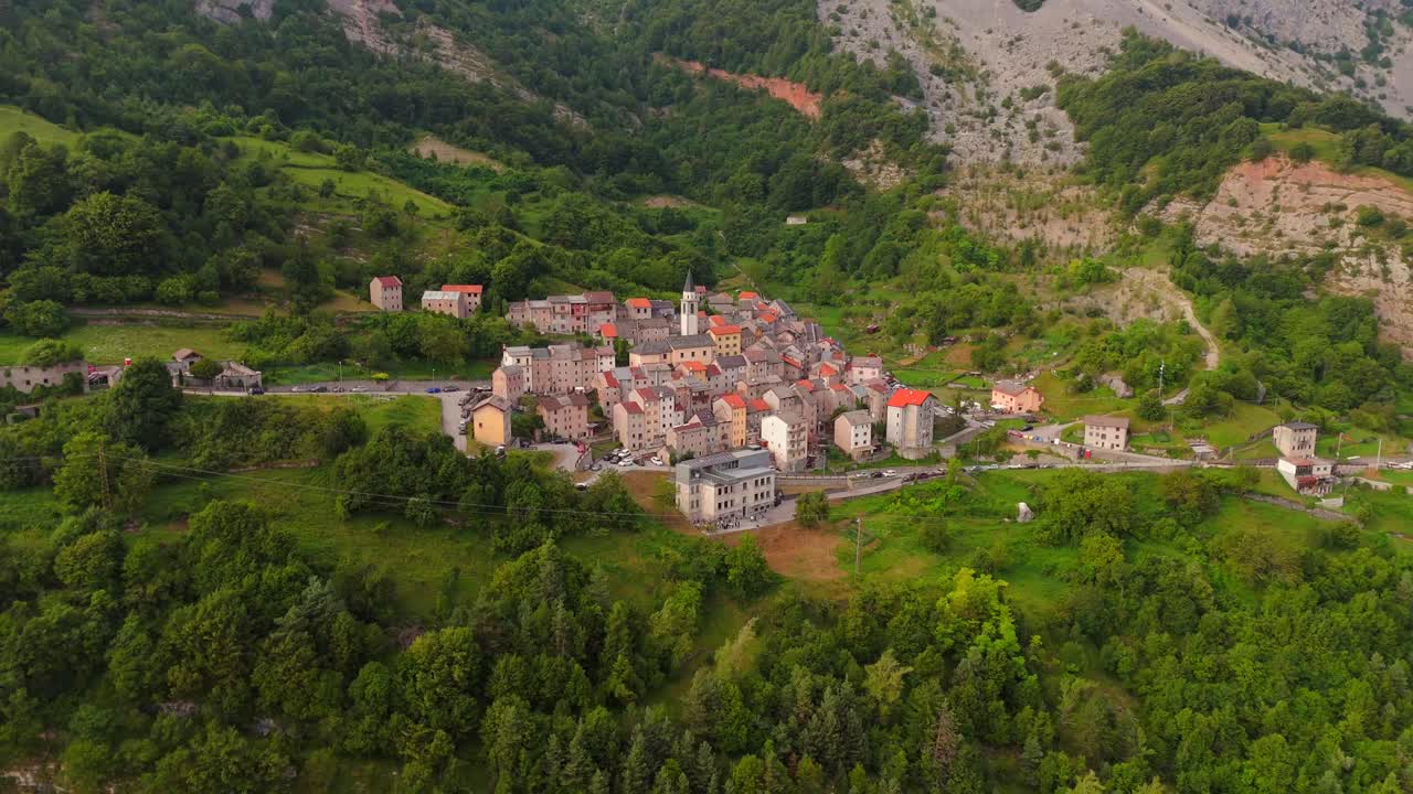 Drone captures the tranquil beauty of Casso, a small village surrounded by the dramatic peaks of the Dolomites.