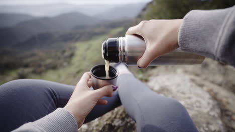 Hot tea serving morning at mountain camping spot